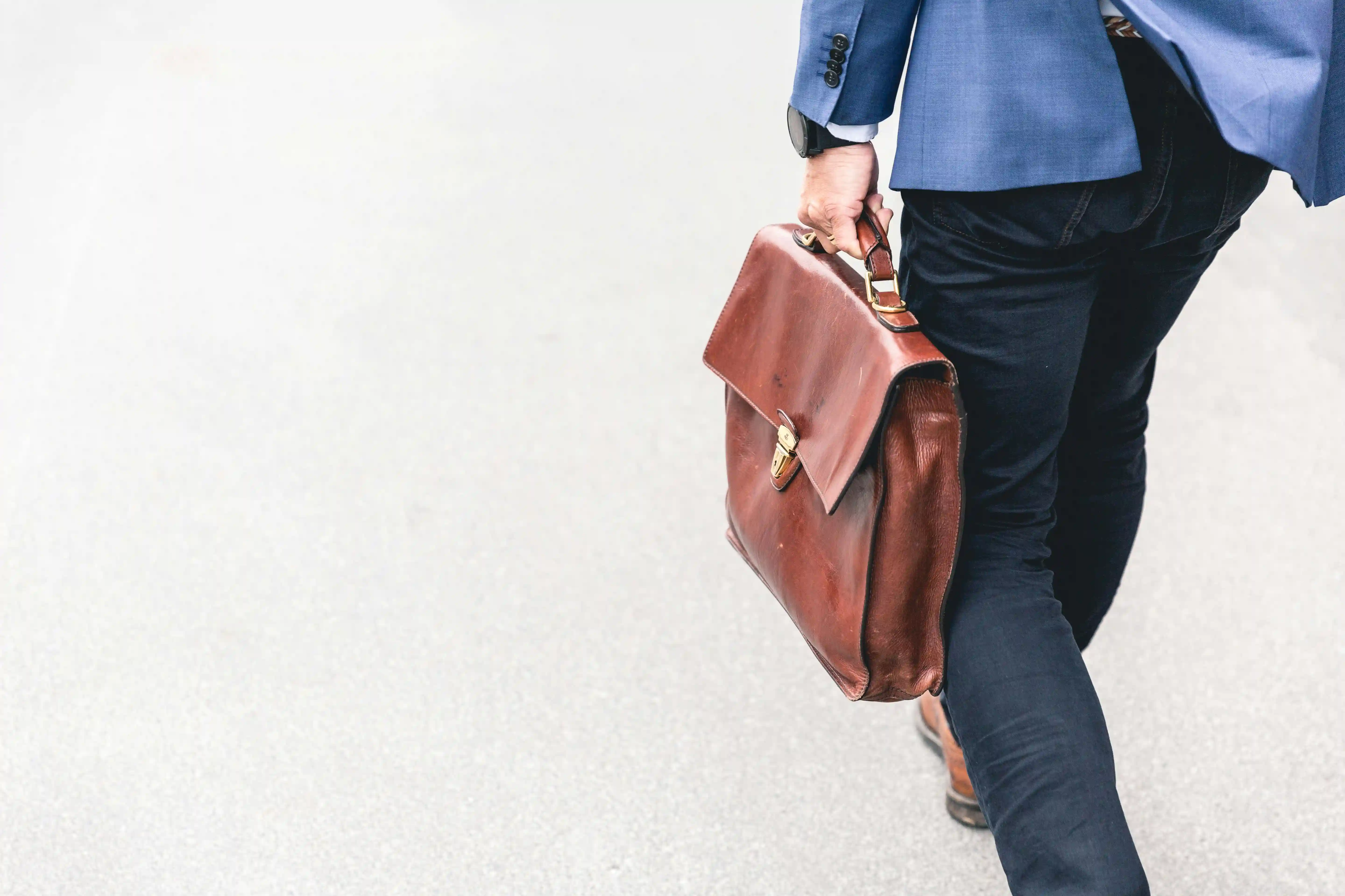 Professional businessman with briefcase representing LMIA-based work permit